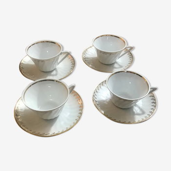 4 coffee cups and white and gold porcelain saucers