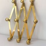 Brass accordion coat rack