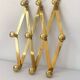 Brass accordion coat rack