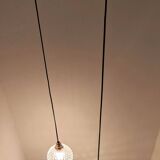 Two-light pendant in a cascade of cut crystal globe