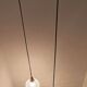 Two-light pendant in a cascade of cut crystal globe