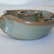 Pair of cellar rat candle holders in glazed sandstone