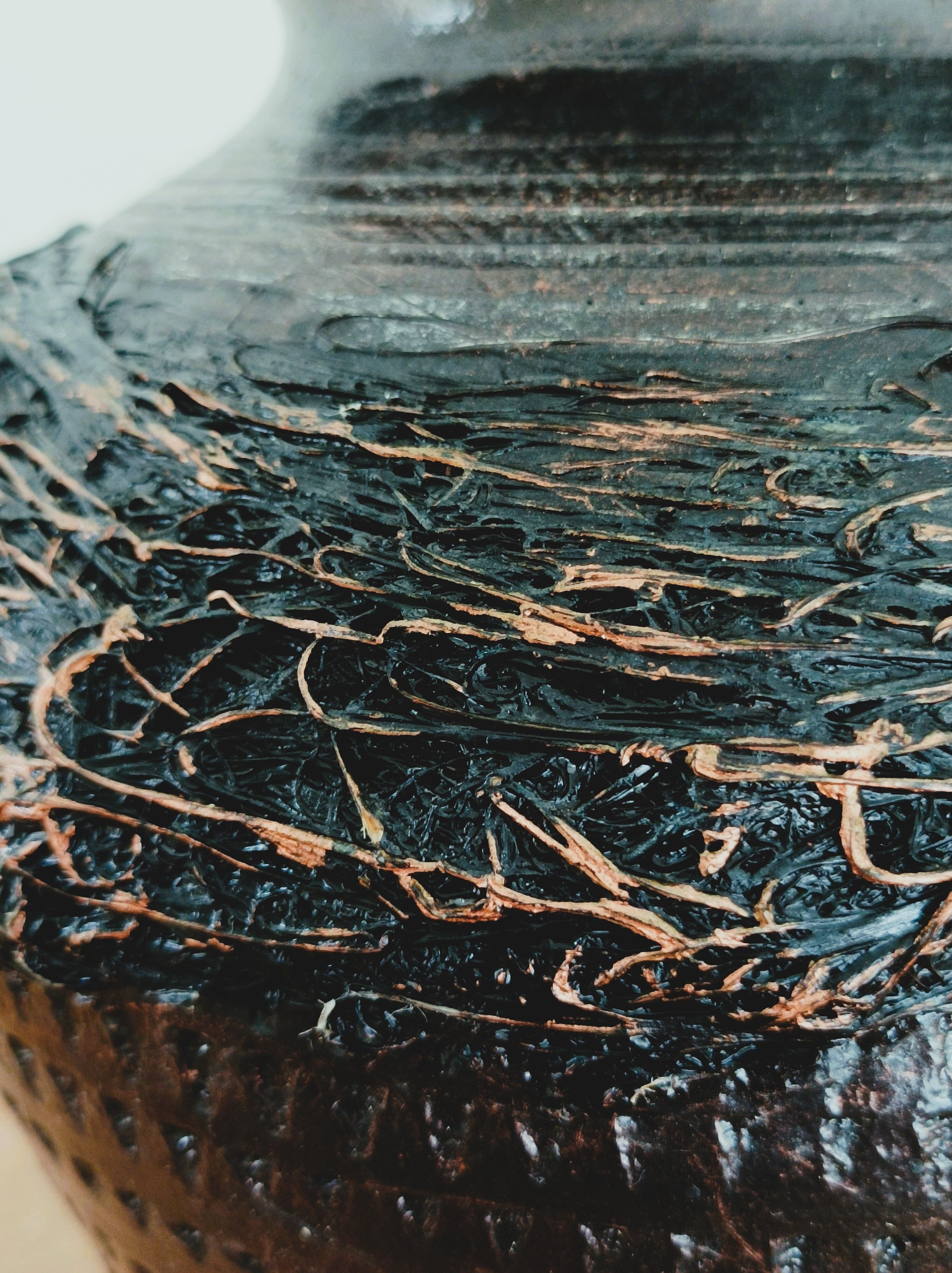Black varnished terracotta pot