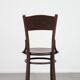 Chaise bistro en bois vintage intemporelle Cosmos avec de magnifiques sculptures.