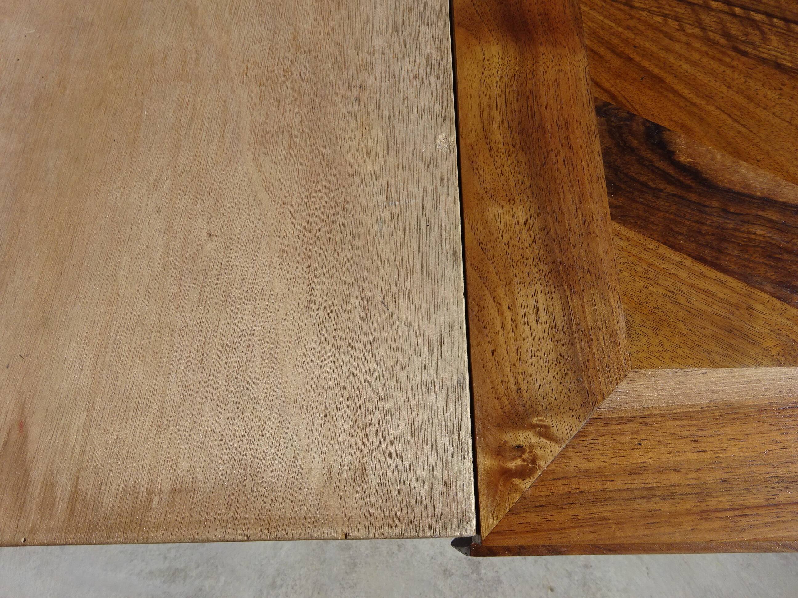 Antique solid walnut table with marquetry and extensions.