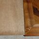 Antique solid walnut table with marquetry and extensions.