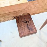 Round extendable wooden dining table