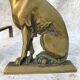 Paire de chenets chiens en laiton