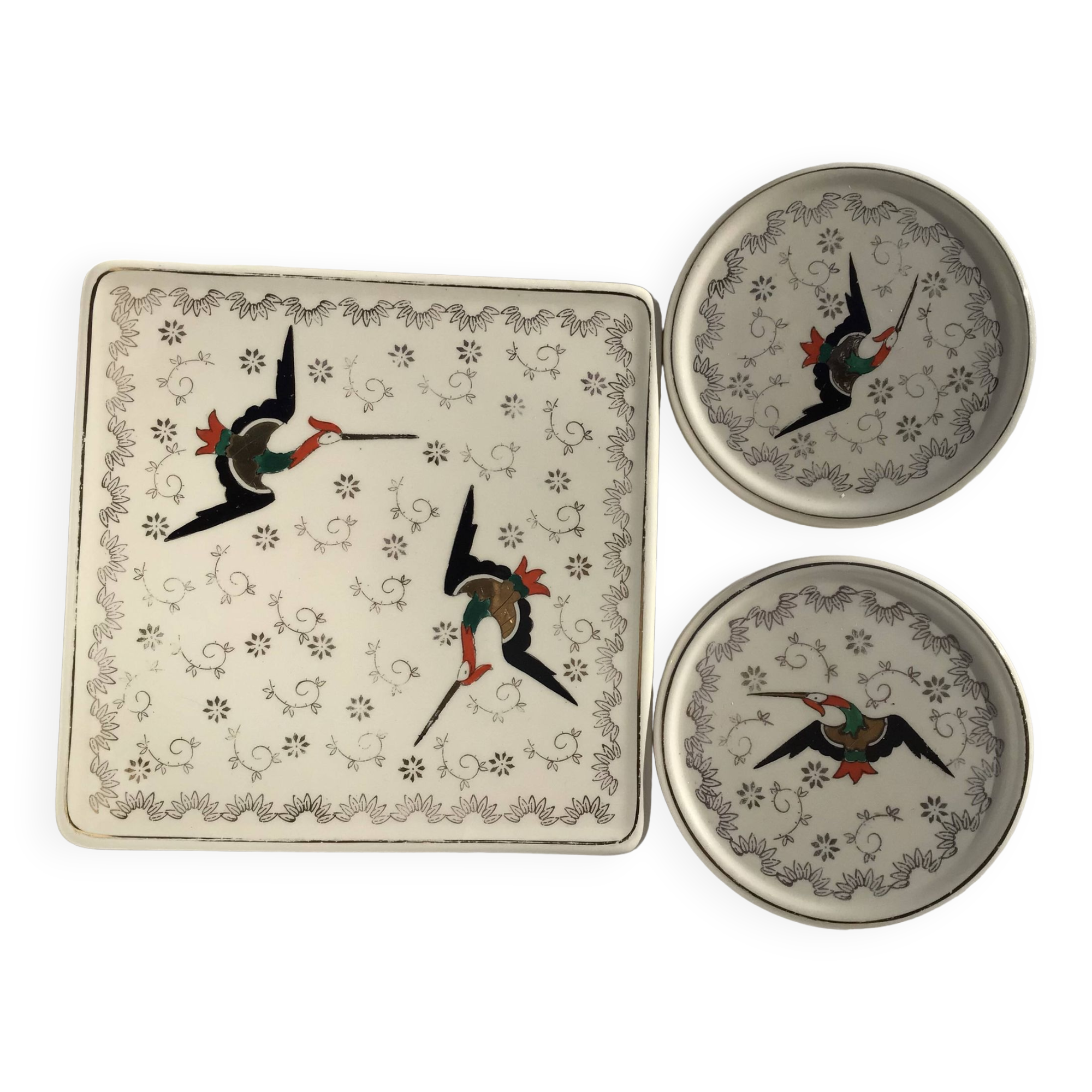 Longwy Chypre cream trivets and bottles