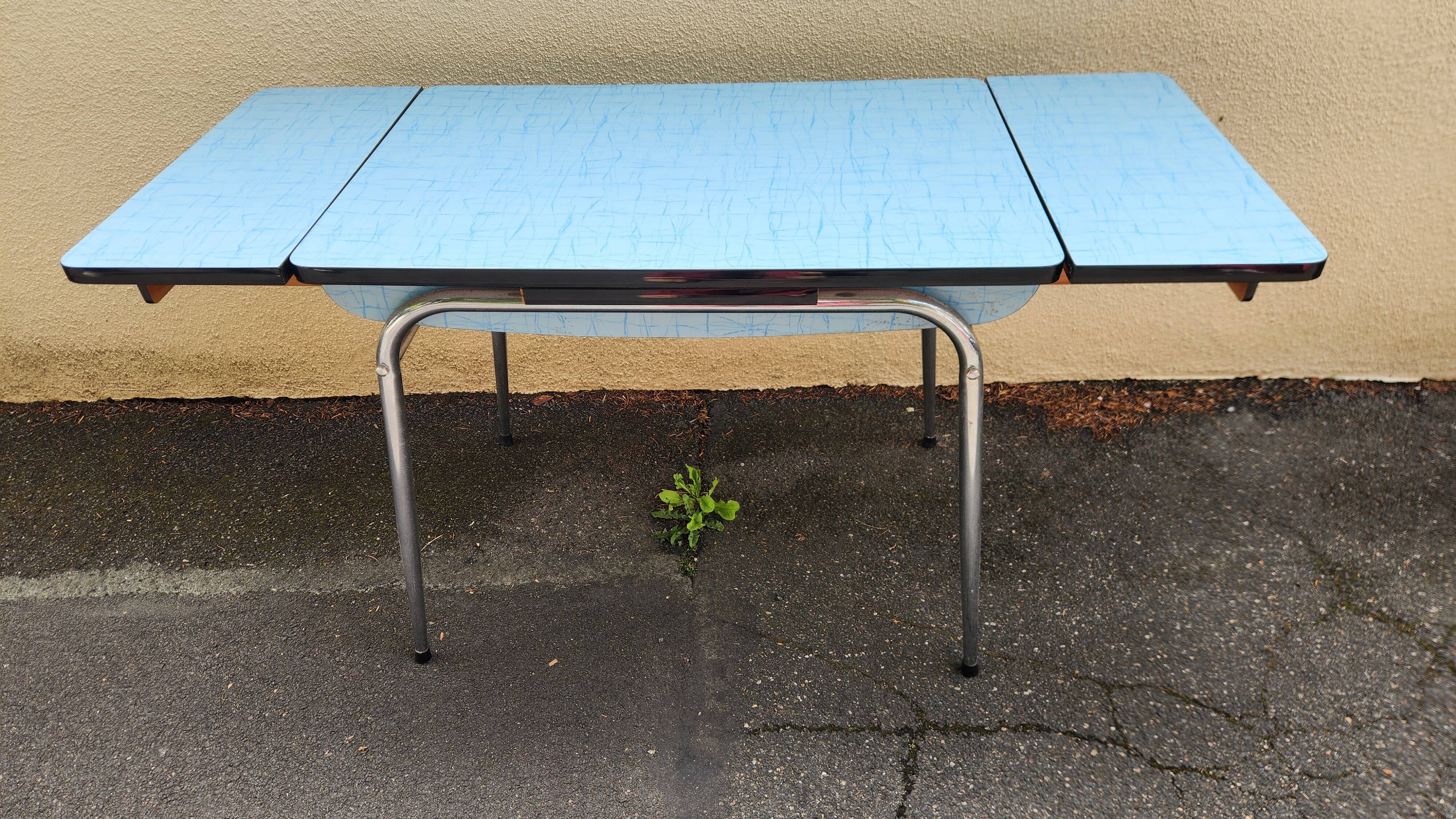 Vintage set from the 60s/70s: table, chairs, and marbled Formica stools.