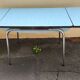Vintage set from the 60s/70s: table, chairs, and marbled Formica stools.