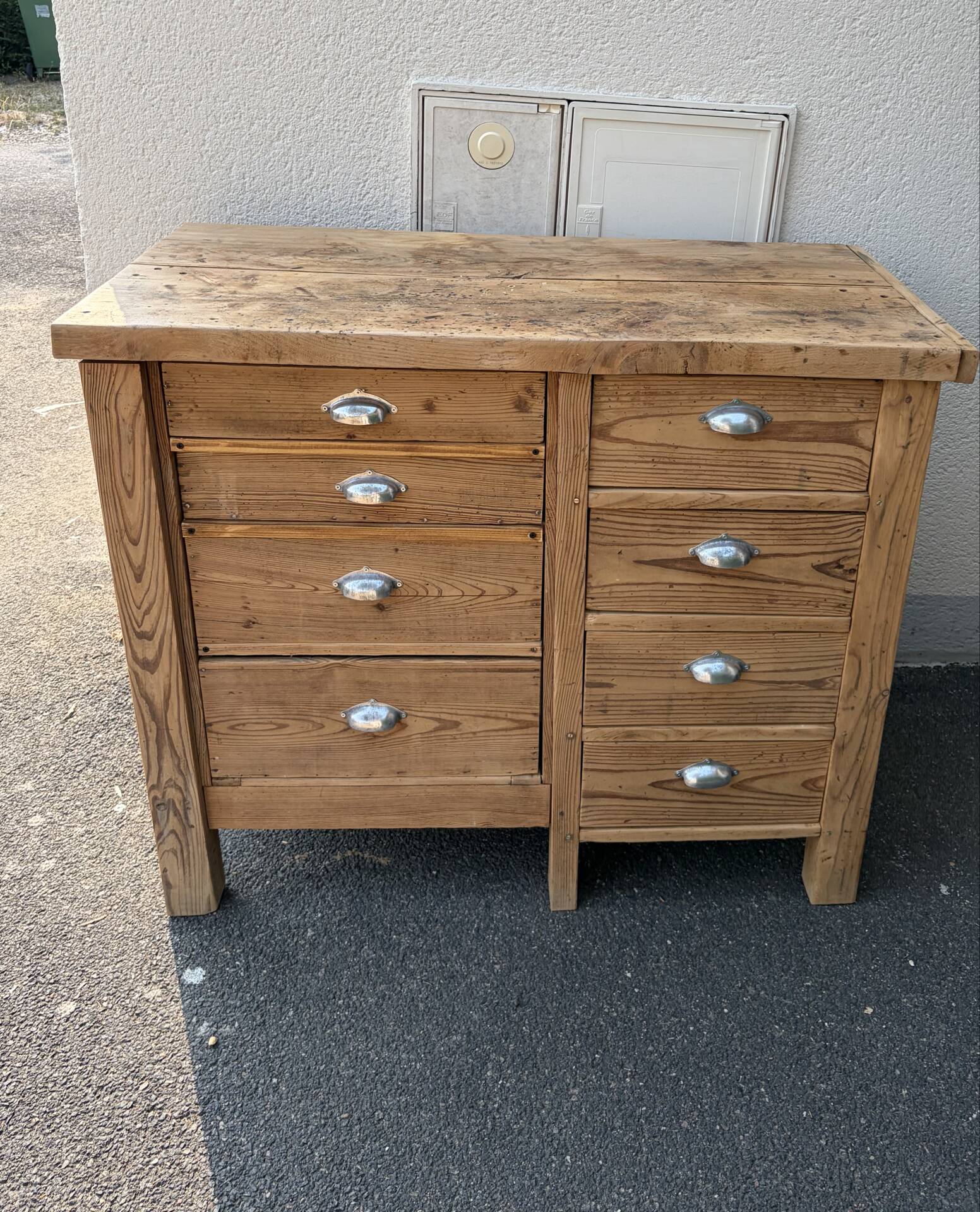 Old wooden workbench with 8 drawers.