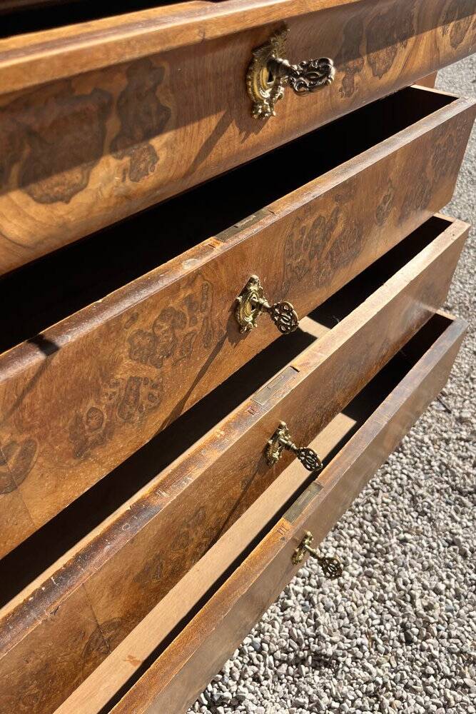 Antique chest of drawers with a grey marble top.