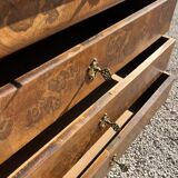 Antique chest of drawers with a grey marble top.