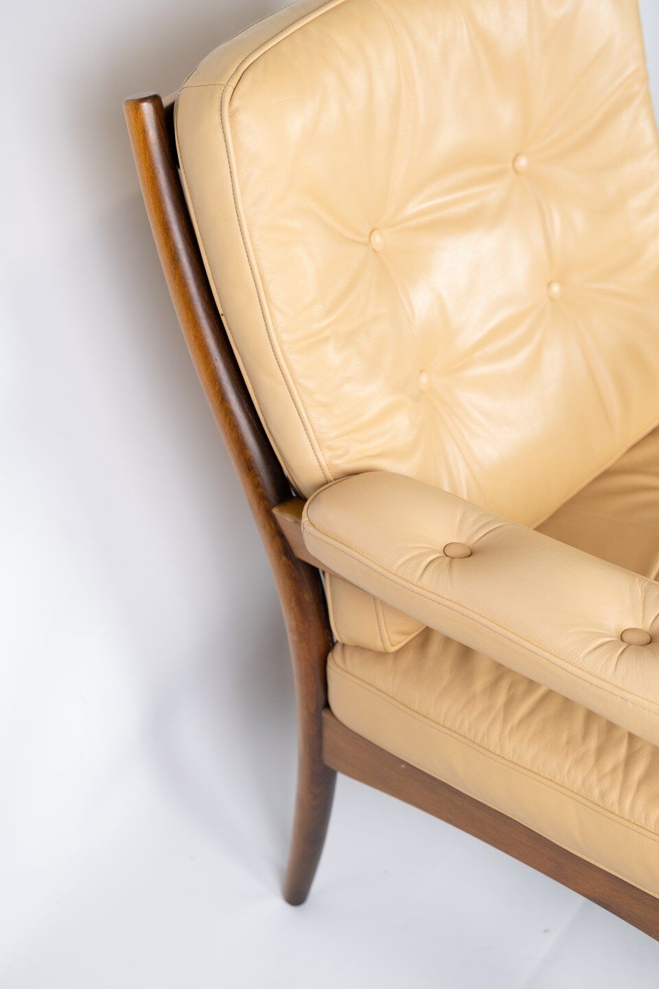 Armchair in dark wood and upholstered with light elegance leather of danish design, 1960s