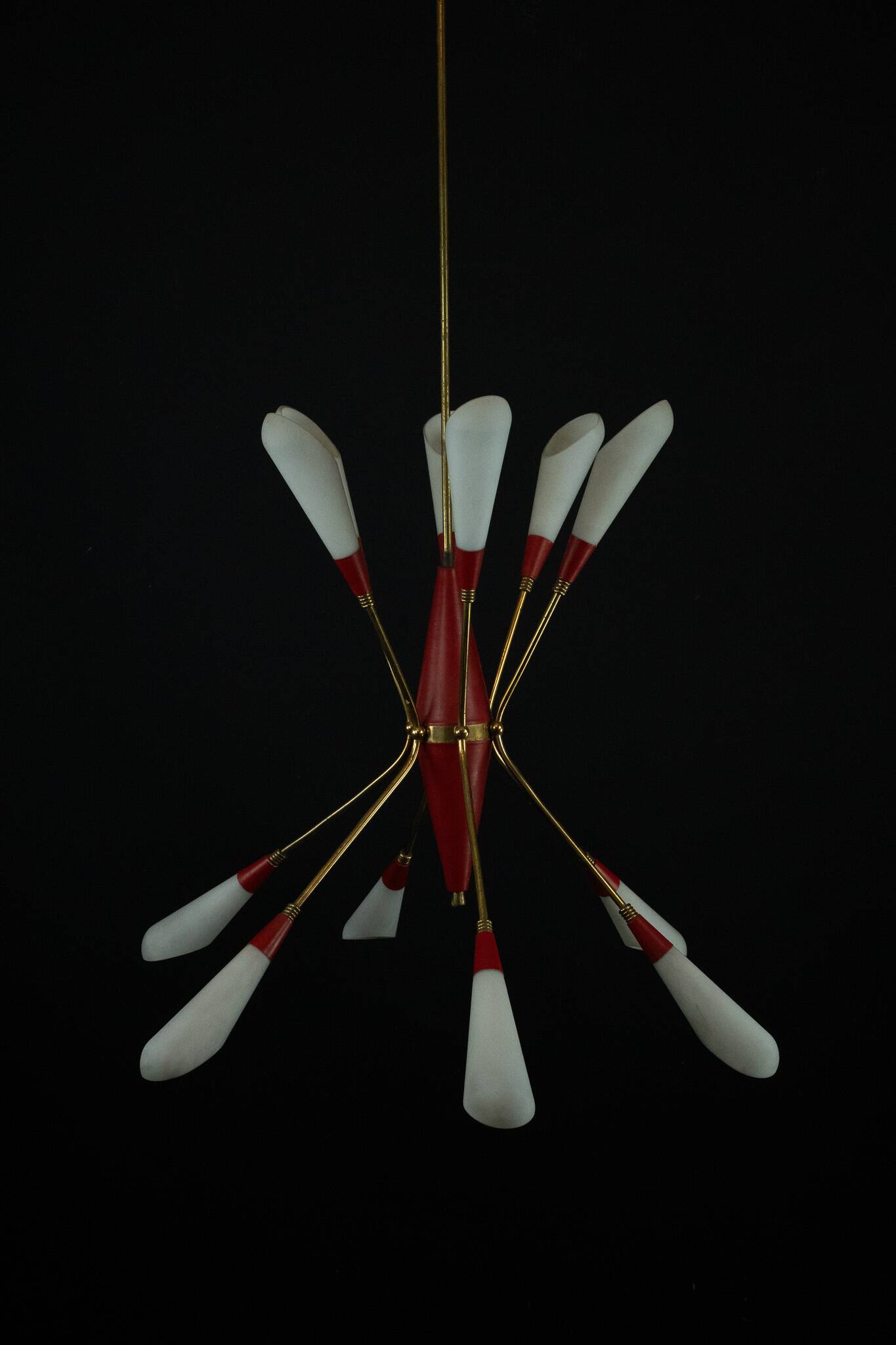 Mid-Century 12 lights chandelier in the manner of Stilnovo. Italy 1950s