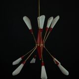 Mid-Century 12 lights chandelier in the manner of Stilnovo. Italy 1950s