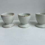 Trio of white shells bordered gold 50s