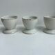 Trio of white shells bordered gold 50s
