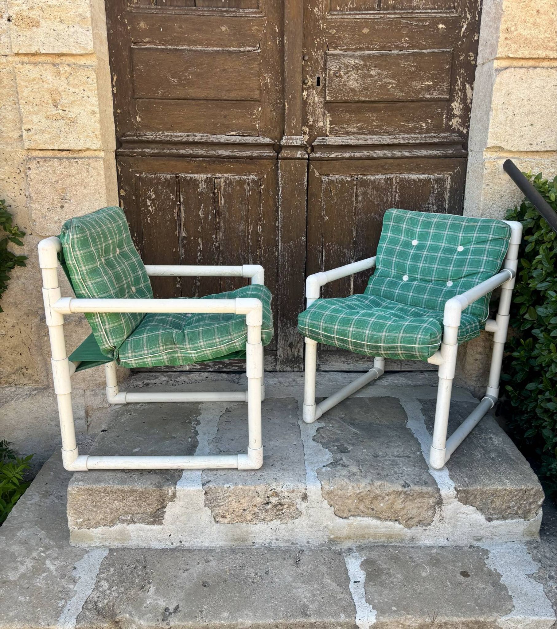 Pair of vintage tubular armchairs from the 70s and 80s, luxury design.