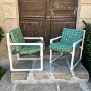 Pair of vintage tubular armchairs from the 70s and 80s, luxury design.