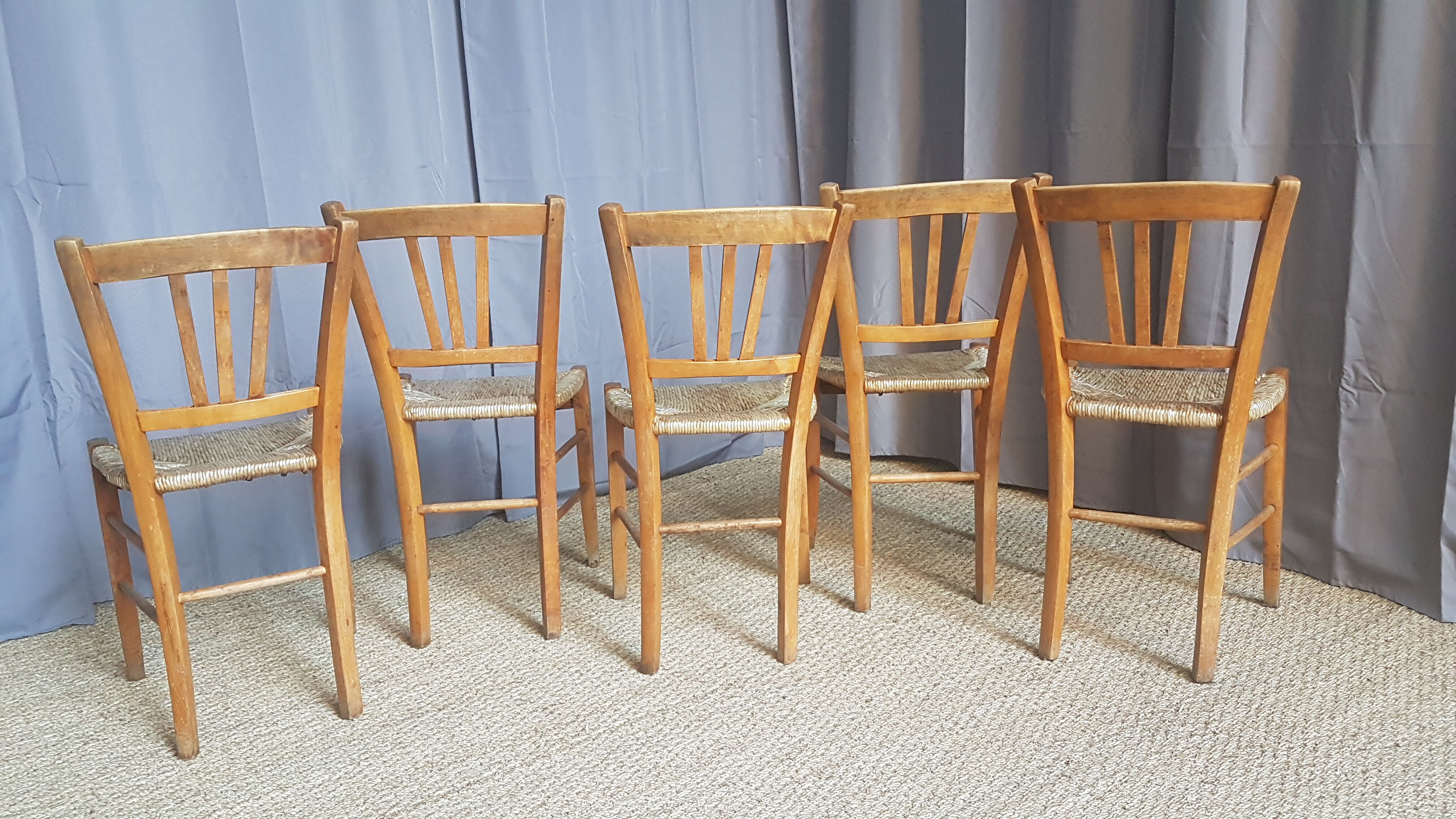 Series of 5 old mulched chairs
