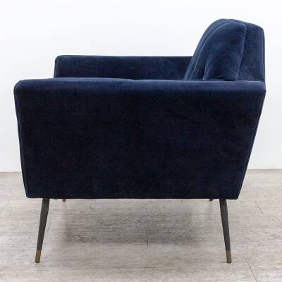 Fauteuil Dutchbone en velours bleu profond