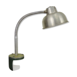 Old industrial articulated lamp with vice. Year 50