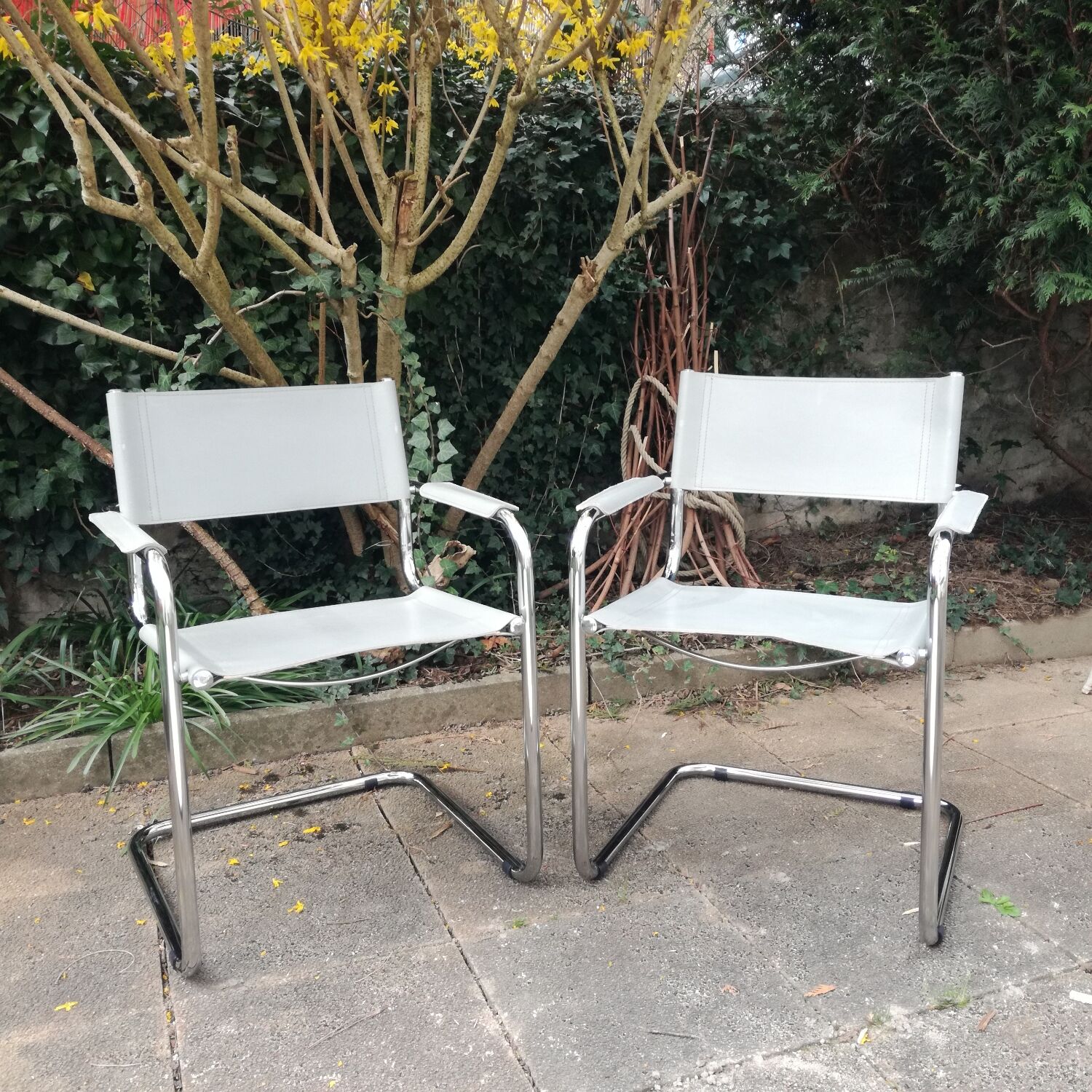 Pair of cantilever armchairs in grey leather made in italy