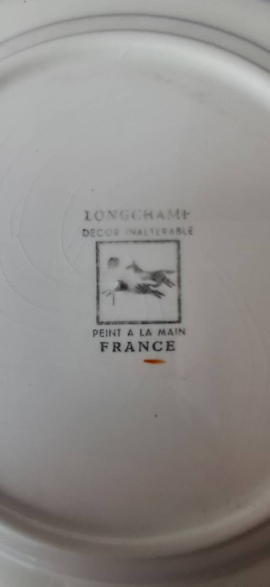 Fluted plate Longchamp, decorated with dragonflies and flowers.