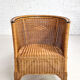 Pair of cabriolet armchairs in wicker and black edging