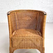 Pair of cabriolet armchairs in wicker and black edging