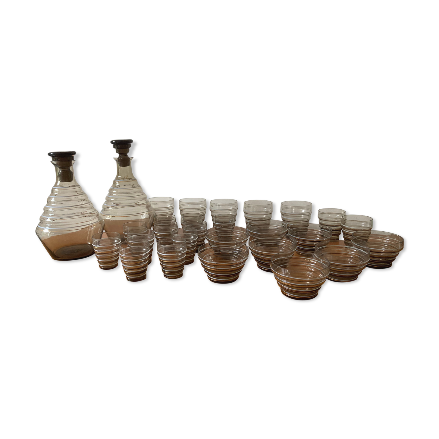 Service of glasses, cups, decanters of the 50s in smoked glass