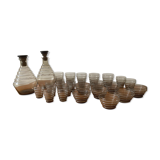 Service of glasses, cups, decanters of the 50s in smoked glass