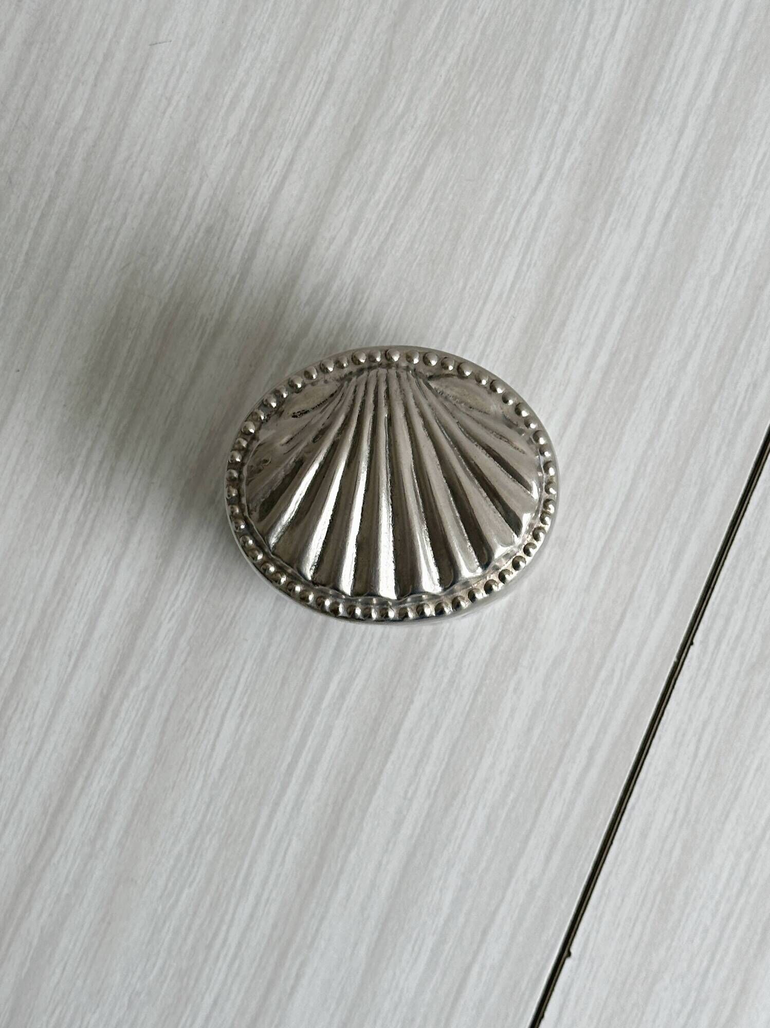 Silver-plated metal catchall with patina