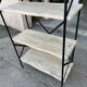 Industrial-style shelf in light wood and cast iron