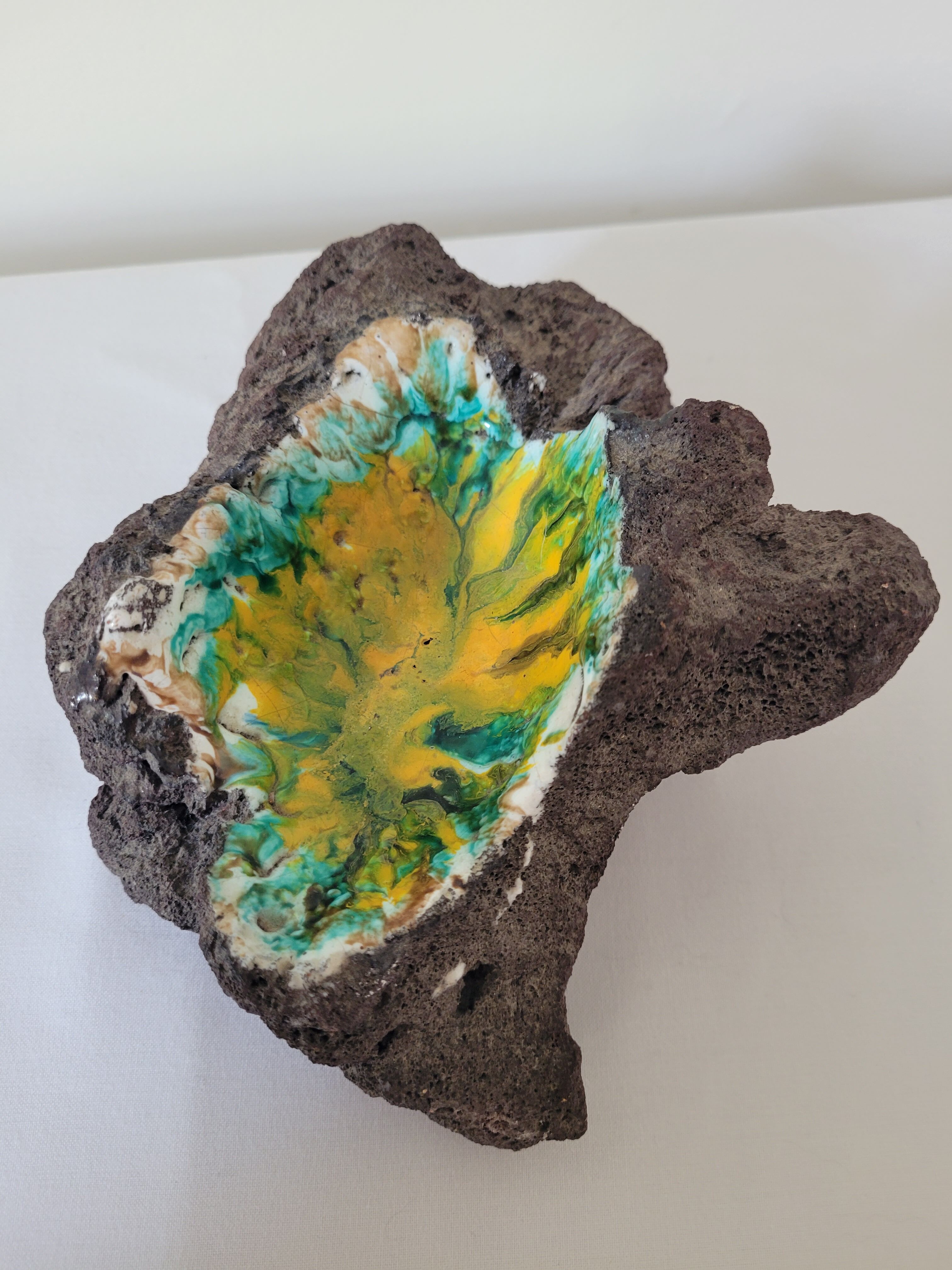 Enamelled lava stone ashtray