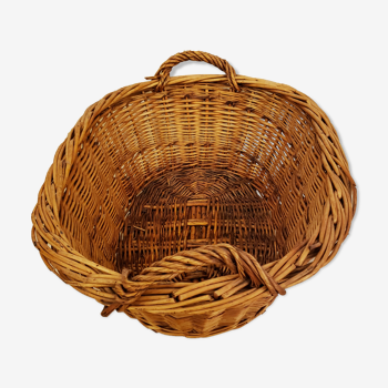 Old oval wicker basket with handles