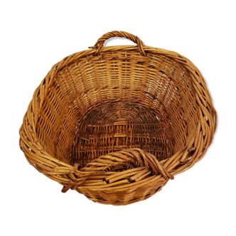 Old oval wicker basket with handles