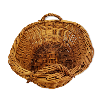 Old oval wicker basket with handles