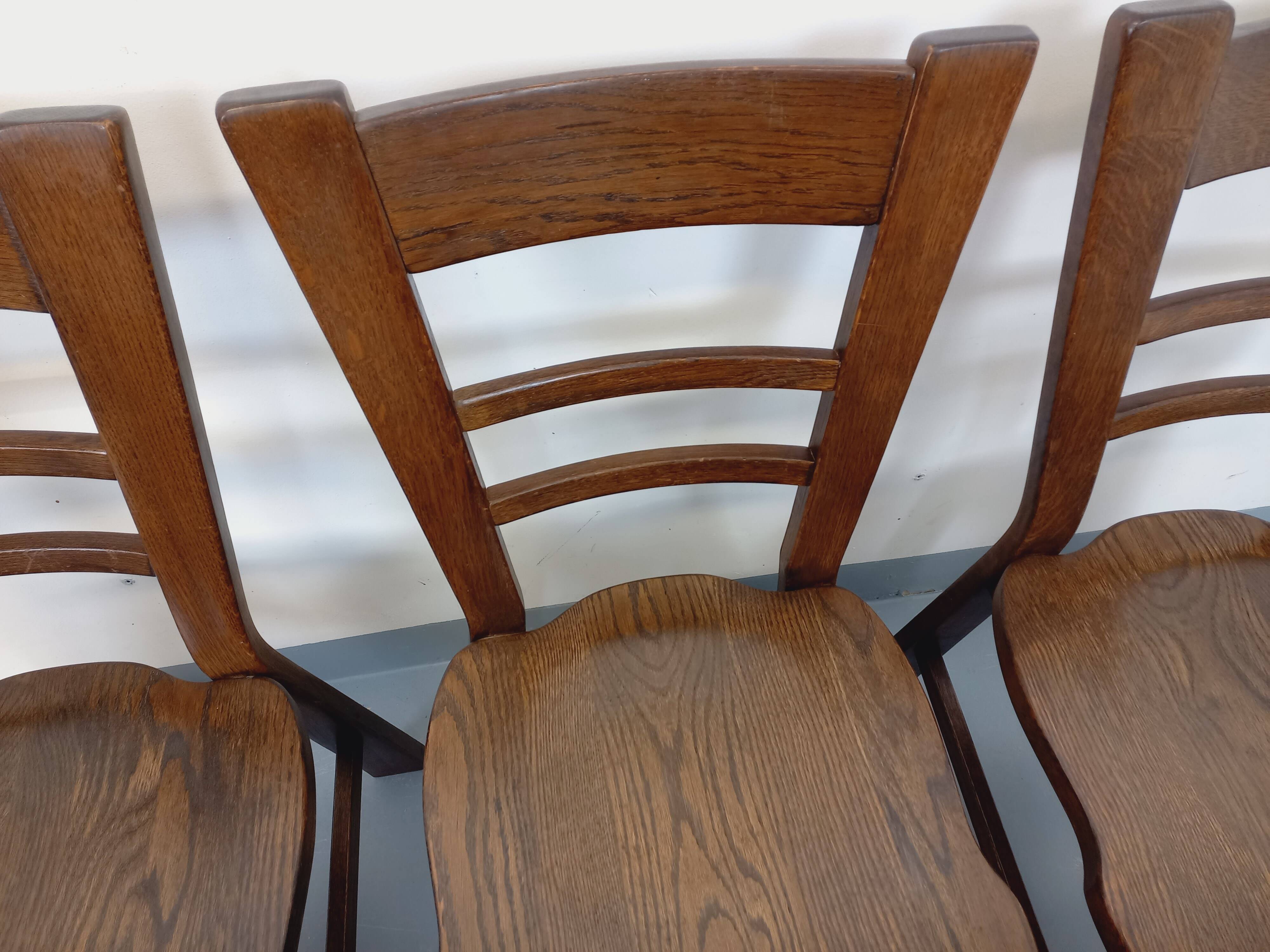 Set of 6 vintage brutalist oak chairs from the 1950s.