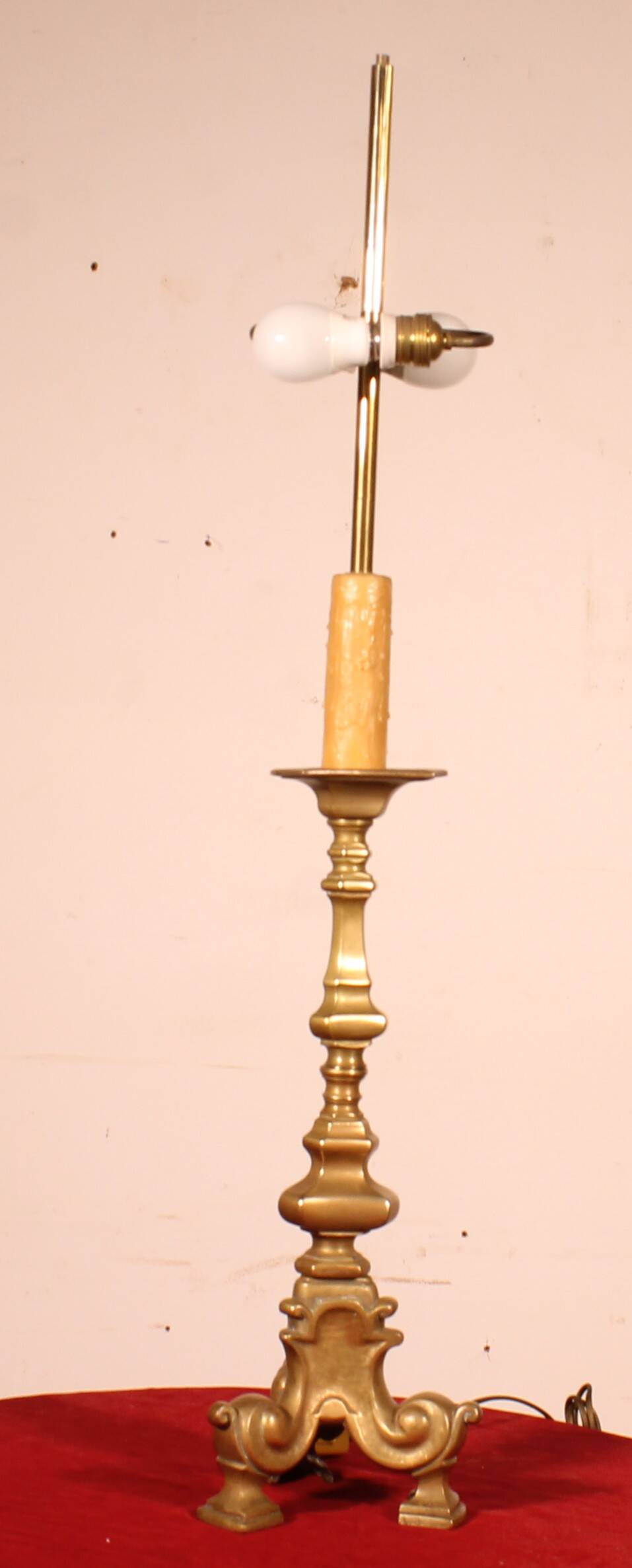 bronze candlestick from the 18th century converted into a lamp with its shade