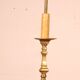 bronze candlestick from the 18th century converted into a lamp with its shade