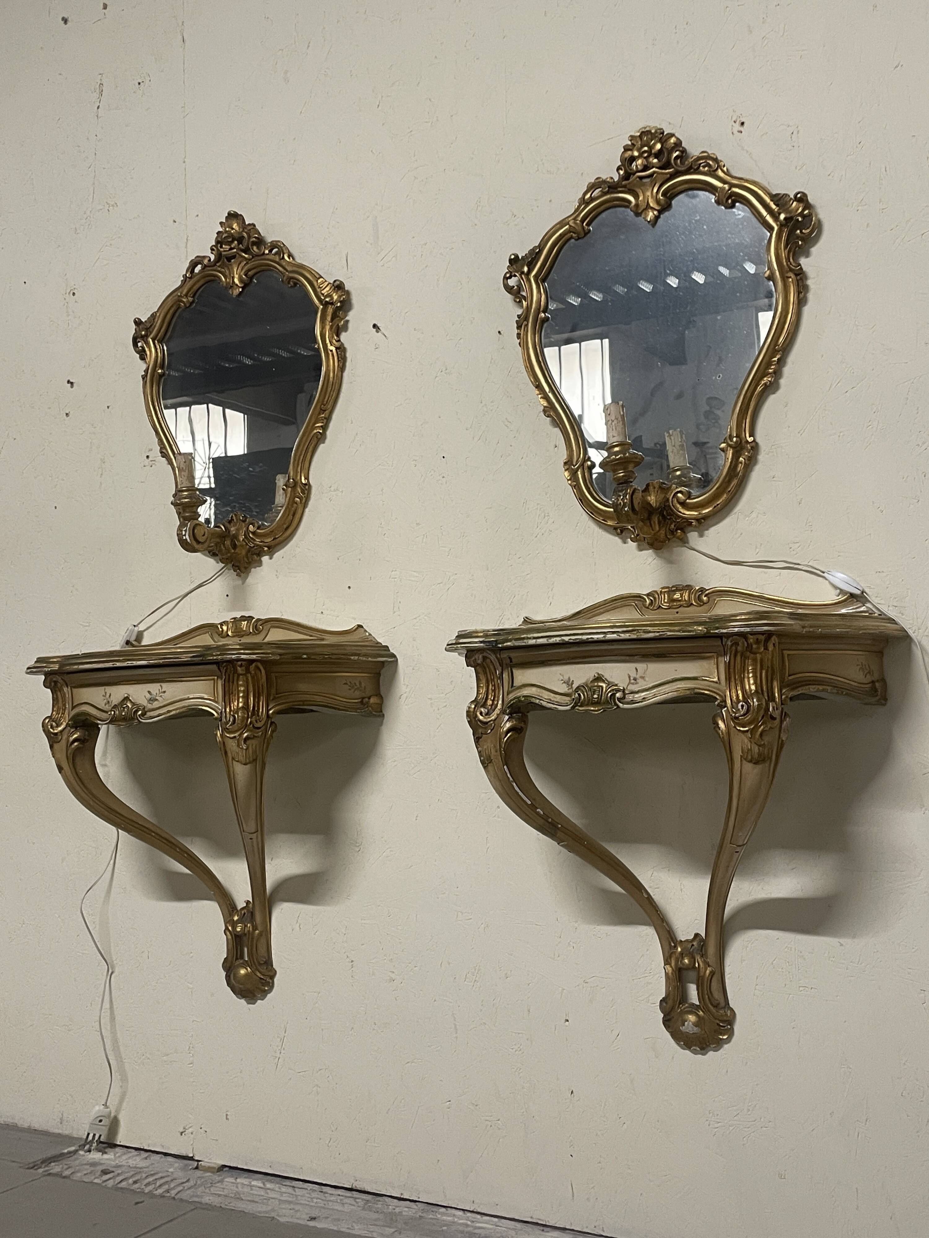 Pair of wall-mounted consoles with a mirror in Louis XV style.