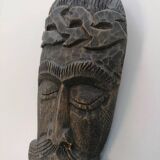African tribal mask in carved wood - decorative ethnic art