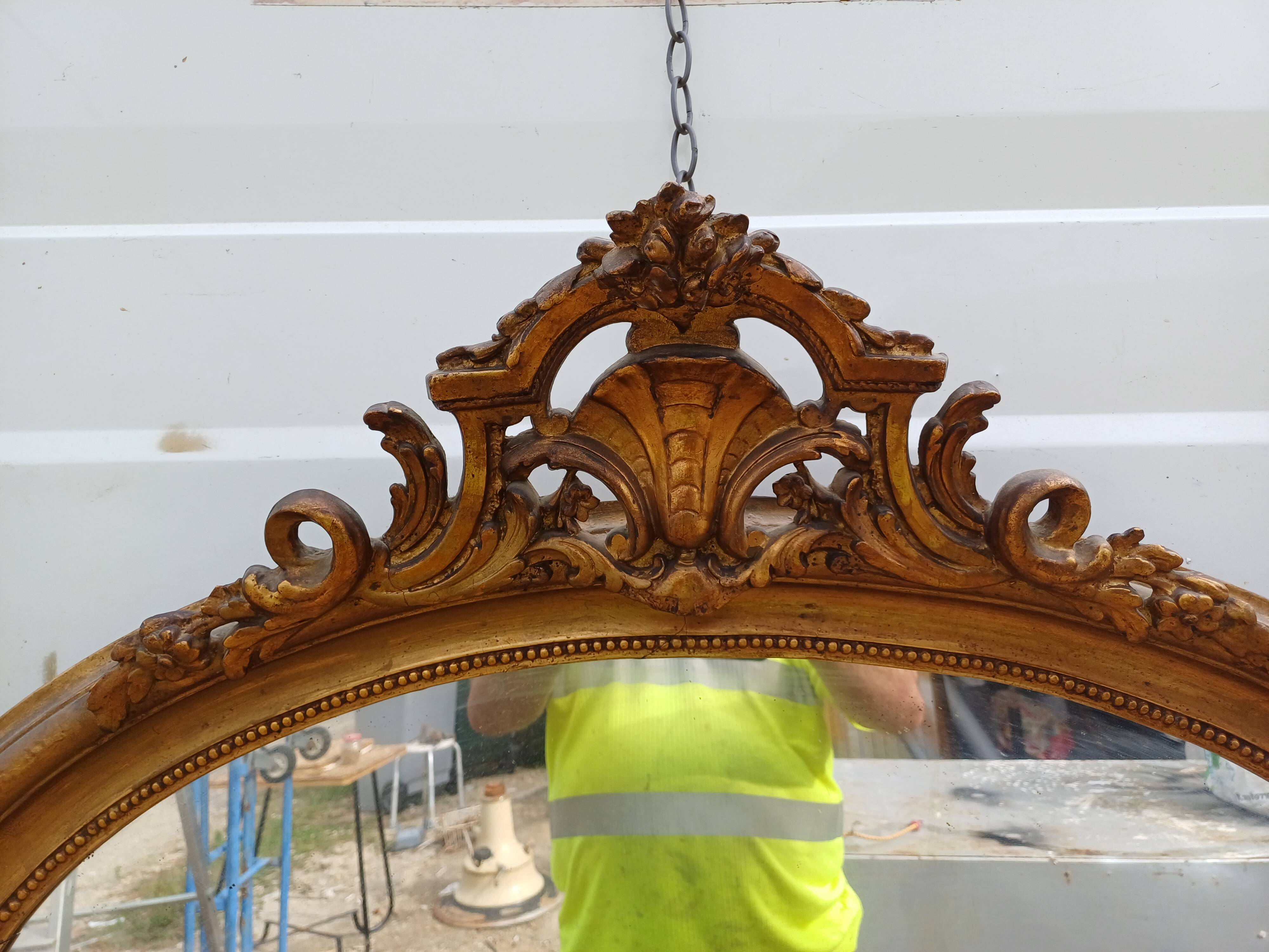 Oval mirror wood and gilded stucco 19th century
