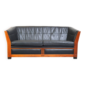 Unique black leather and wooden Art Deco design 2.5-seater sofa with an amazing appearance
