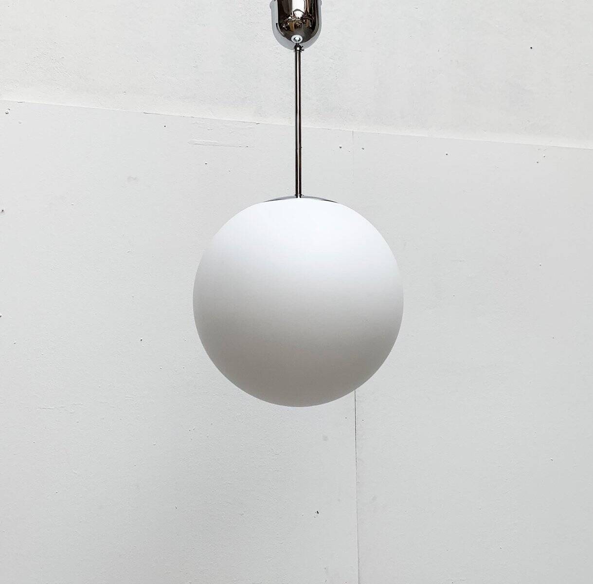 Vintage German space age glass ball pendant lamp by Limburg.