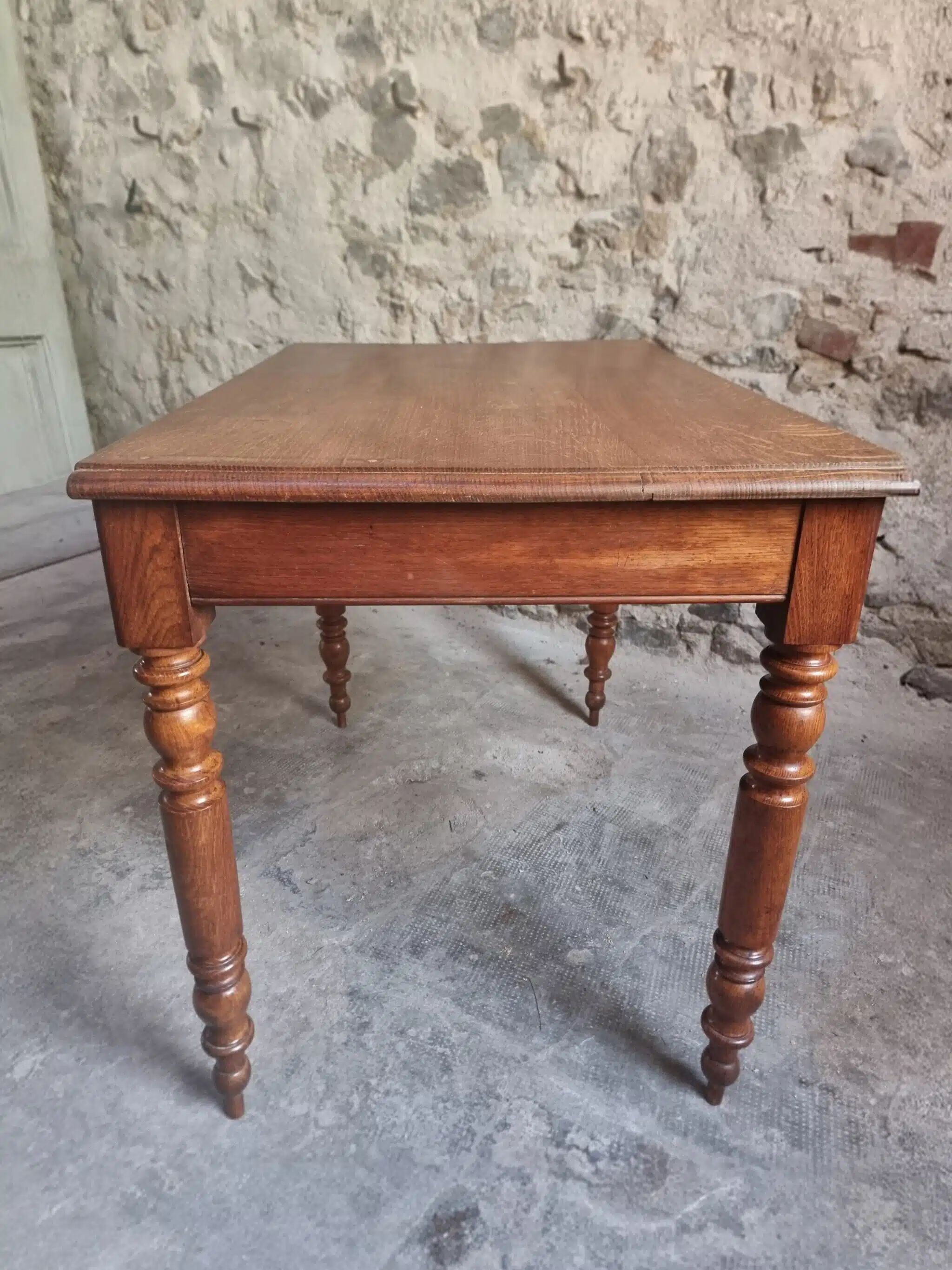 Antique French oak writing desk with 2 lockable drawers, circa 1920.