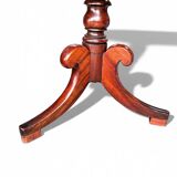 19th-century solid mahogany tilting table with a brass mechanism.